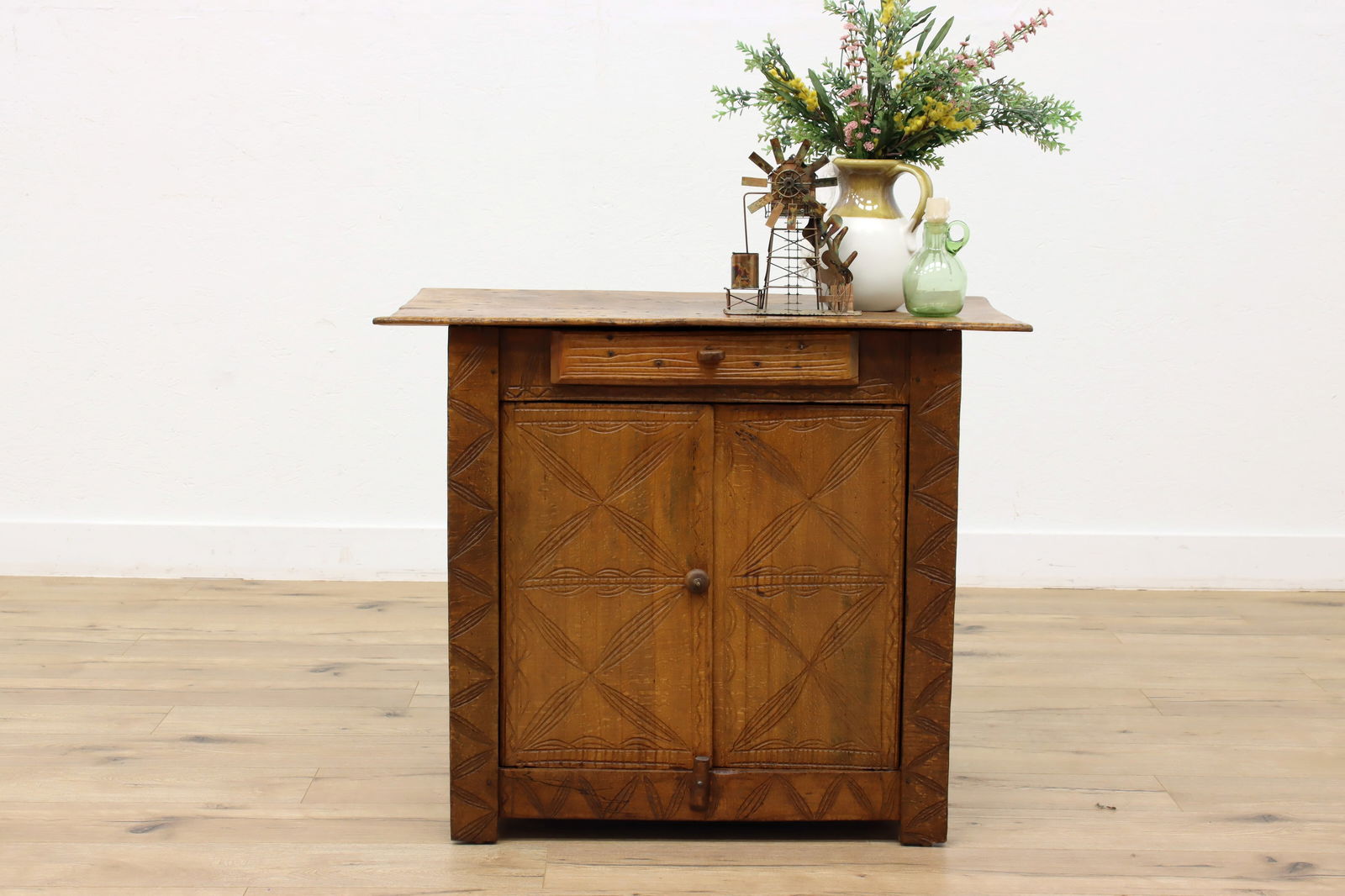 Farmhouse Folk Art Antique Dutch Indies Primitive Cabinet #46658: A charming farmhouse hall, bar, or bathroom cabinet from the Dutch East Indies has folk art carvings. 1900s antique primitive furniture. Solid birch hardwood with hand planing and carving.Original fin