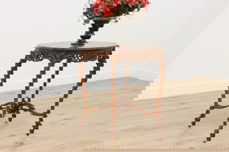 French Design Antique Carved Center Entry Table, Marquetry #47994: A French design center or entry table has beautiful marquetry and carved detailing. American antique 1920s furniture. Walnut & French walnut. Top surface has been refinished for durability. The rest o