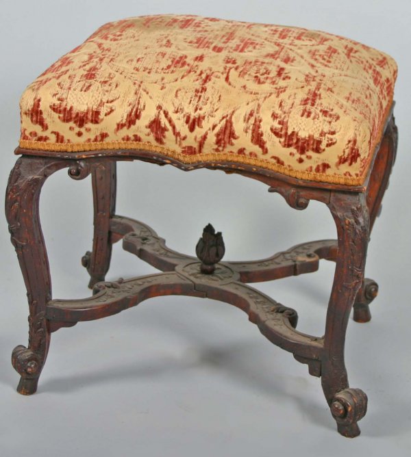 Continental Rococo footstool: Continental Rococo footstool, late 18th century. Various losses, repairs and restoration. Feet ended out. 22" x 20" x 21.5
