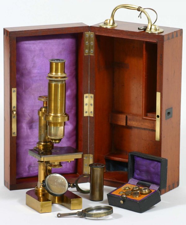 Hartnack & Prazmowski Microscope: Mahogany dovetailed microscope in case marked E. Hartnack & A Prazmowski - A. Prazmowski Paris- Prang Boston, along with accessories including small case with 6 lenses and matching serial number to ca