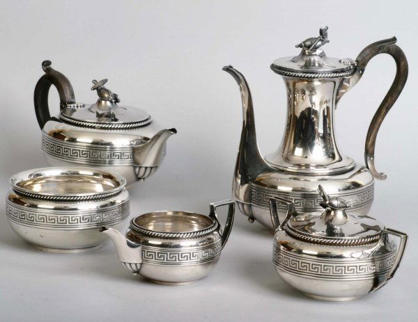 Tiffany & Co Tea Service circa 1860: Five piece Tiffany & Co Sterling Silver Tea Set, Coffee Pot 9 in, Tea Pot 5 in. 82.8 Troy oz total. Slight dents on waste and sugar bowls. Monogrammed CBG for Caroline Battle Grandin, a Southern Famil