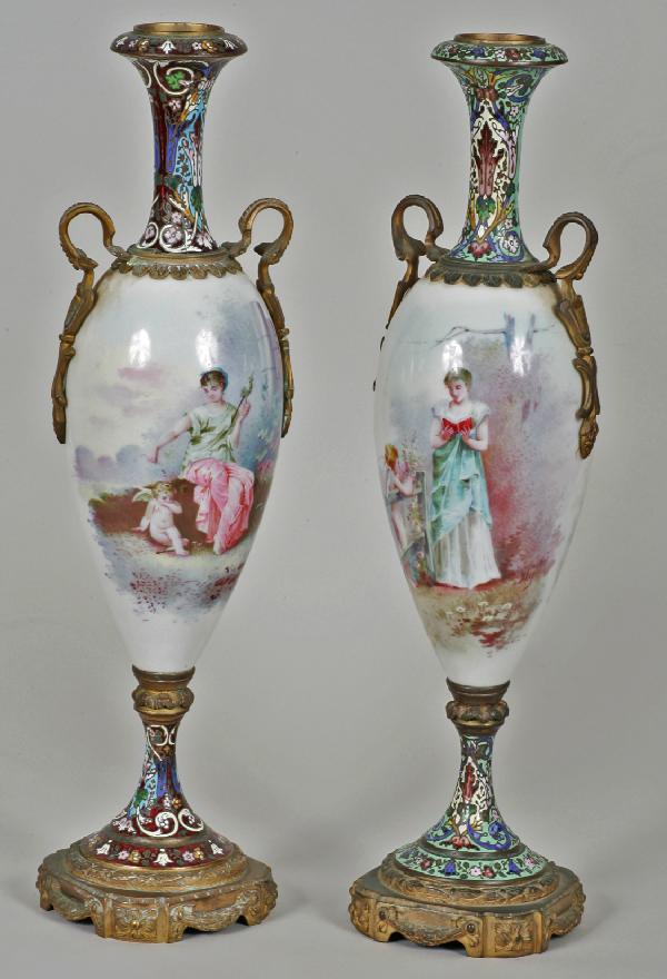 Pair of Bronze Mounted Sevres Mantle Vases: Pair of bronze mounted Sevres mantle vases w/champleve decoration H: 19", l signed Paly, l signed R. Petit Note - Color variations in bases