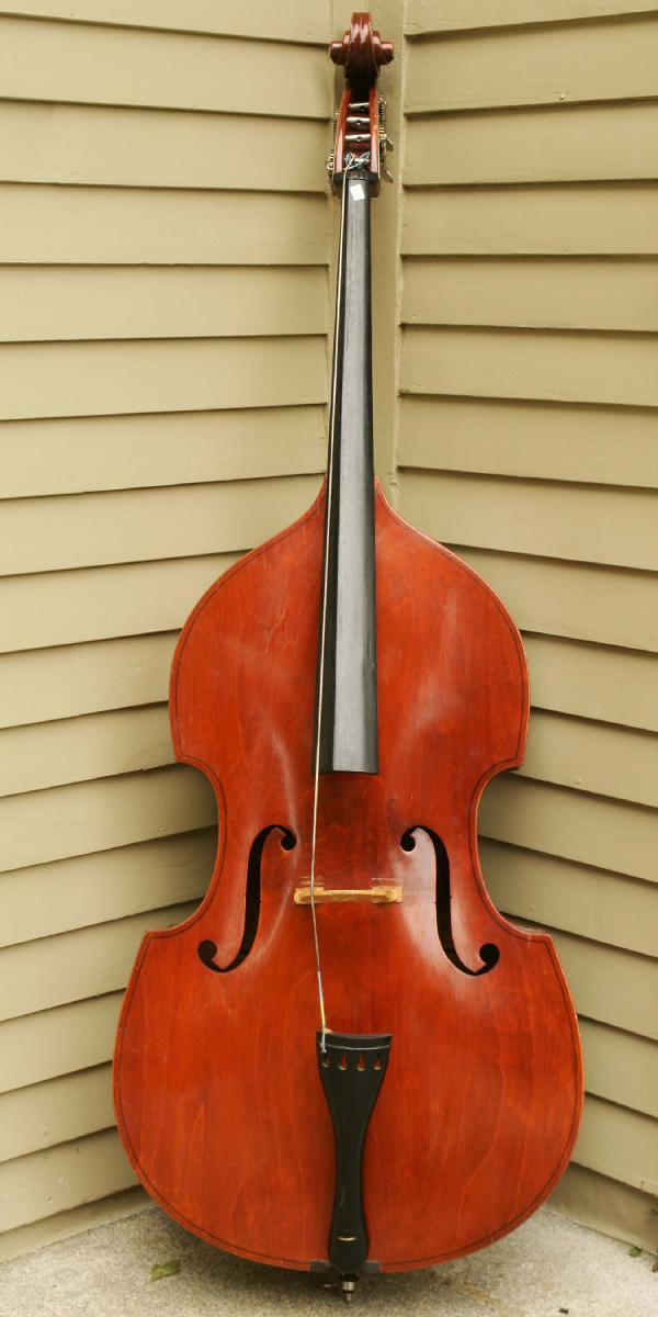 Otto Rubner Acoustic Bass: Acoustic Base signed Rubner (Otto Rubner) this appearing to be a Gumba style 1938 w/zippered case (no bow). Note three strings missing. Size H: 72-1/2", W: 25-1/2". 2 inch chafe/scratch upper right of