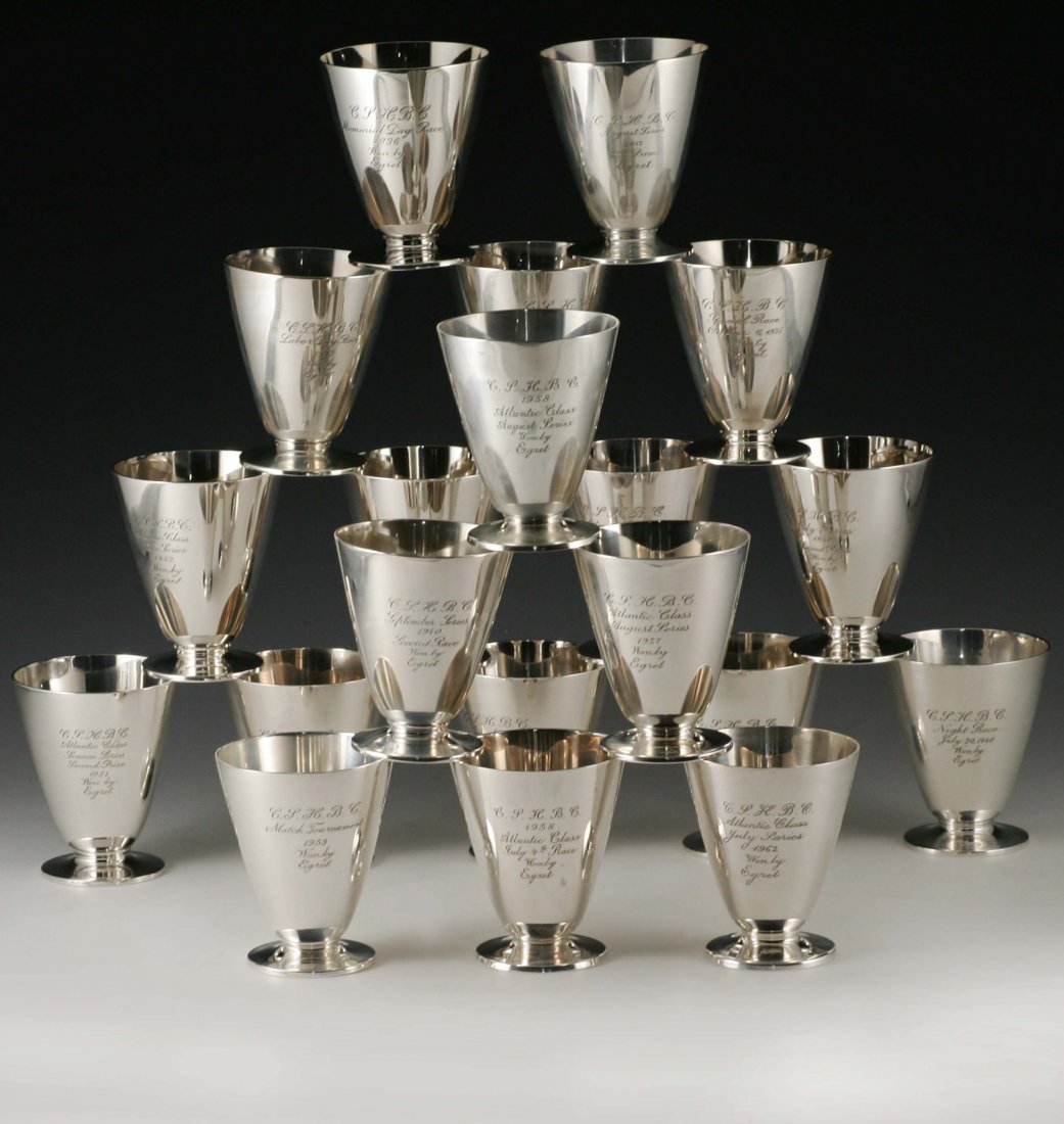 20 Tiffany Sterling Yachting Trophies: Twenty Tiffany & Co. sterling silver footed cups, all are trophies won by the yacht 'Egret', dated 1935 to 1962 and marked C.S.H.B.C., Cold Springs Harbor Boat Club. Height 3 inches. Also, four Gorham