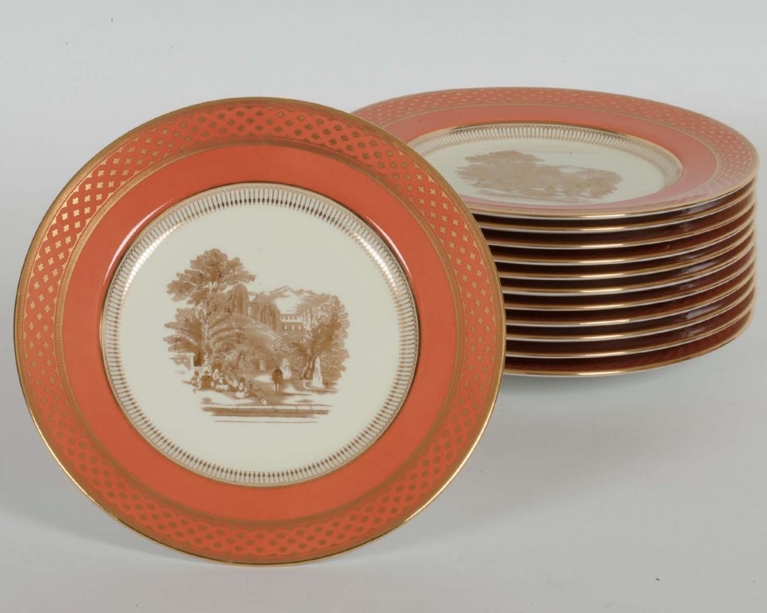 12 Spode Salmon & Gold Dessert Plates: Twelve Spode salmon and gold dessert plates; D: 9"; one with minor discoloration