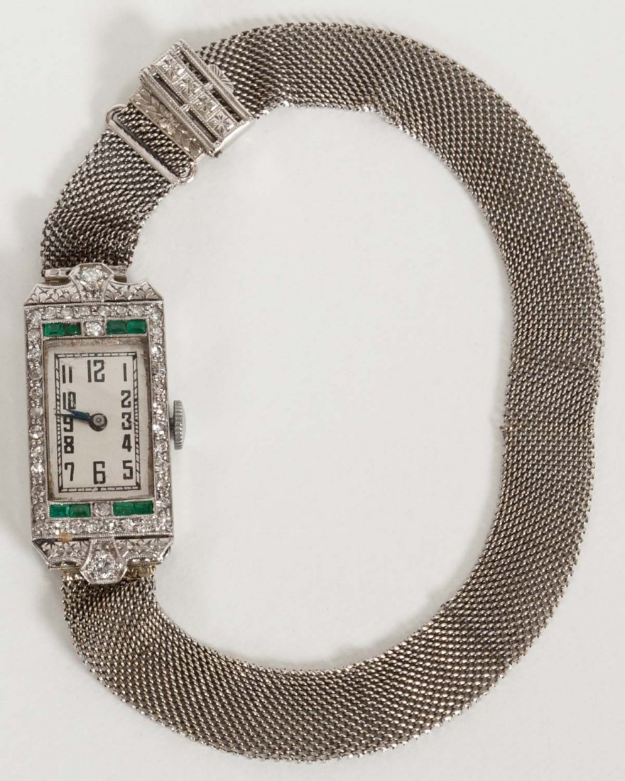 Art Deco Platinum & Emerald Watch: Art Deco platinum watch with tiny emeralds and tiny diamonds of approximately .60 carats, mesh bracelet marked 14K Kreisler