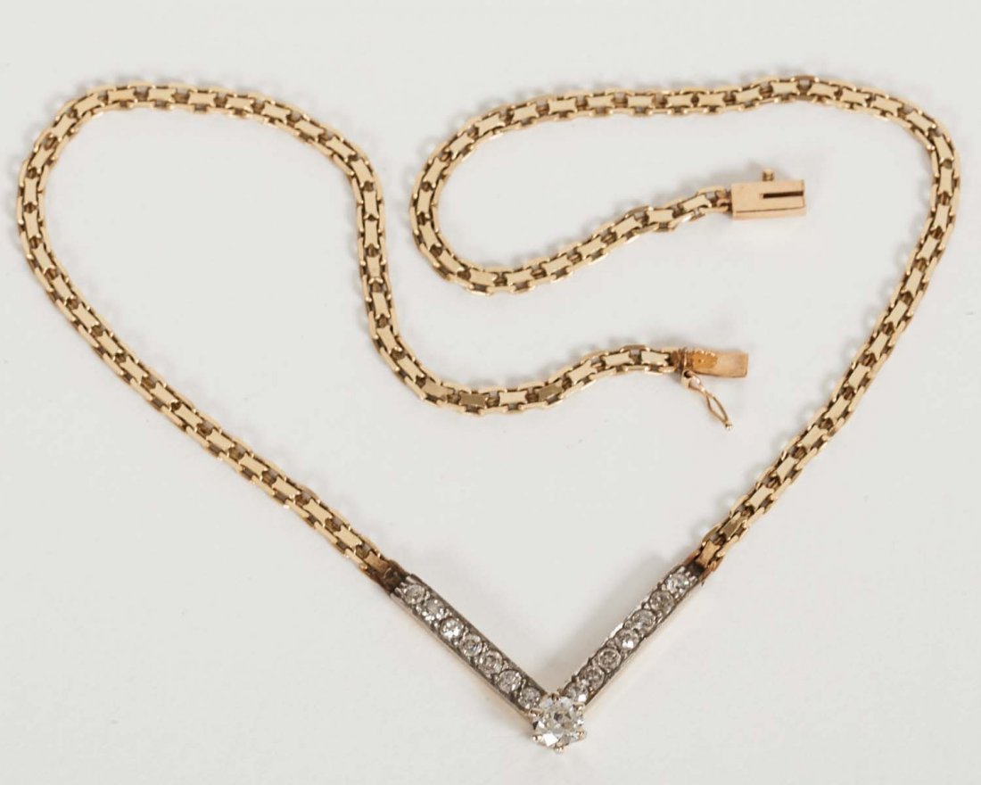 14k Yellow Gold Necklace Set: Fourteen karat yellow gold necklace set with fourteen Old European cut diamonds and one .72 carat Old European cut diamond. Approx weight less stones 5.2 Dwt