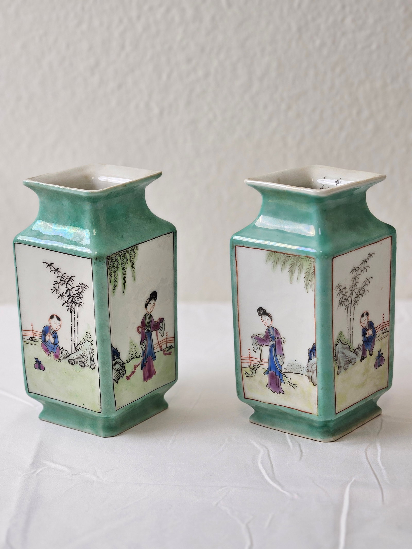 A Pair of Antique Chinese Famille Rose Porcelain Vases: A Pair of Antique Chinese Famille Rose Porcelain Vases