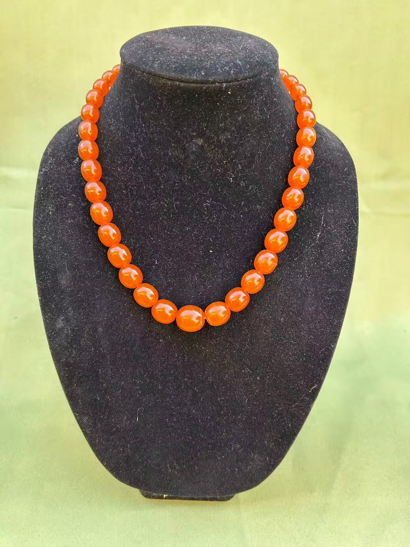 A handmade red coral necklace: A handmade red coral necklace