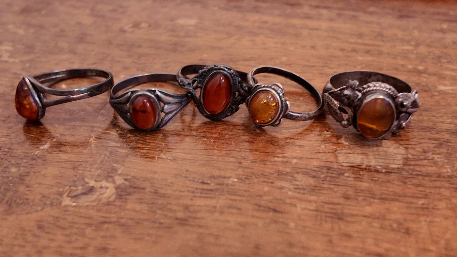 Five pieces of antique sterling silver amber rings (1 of 4)