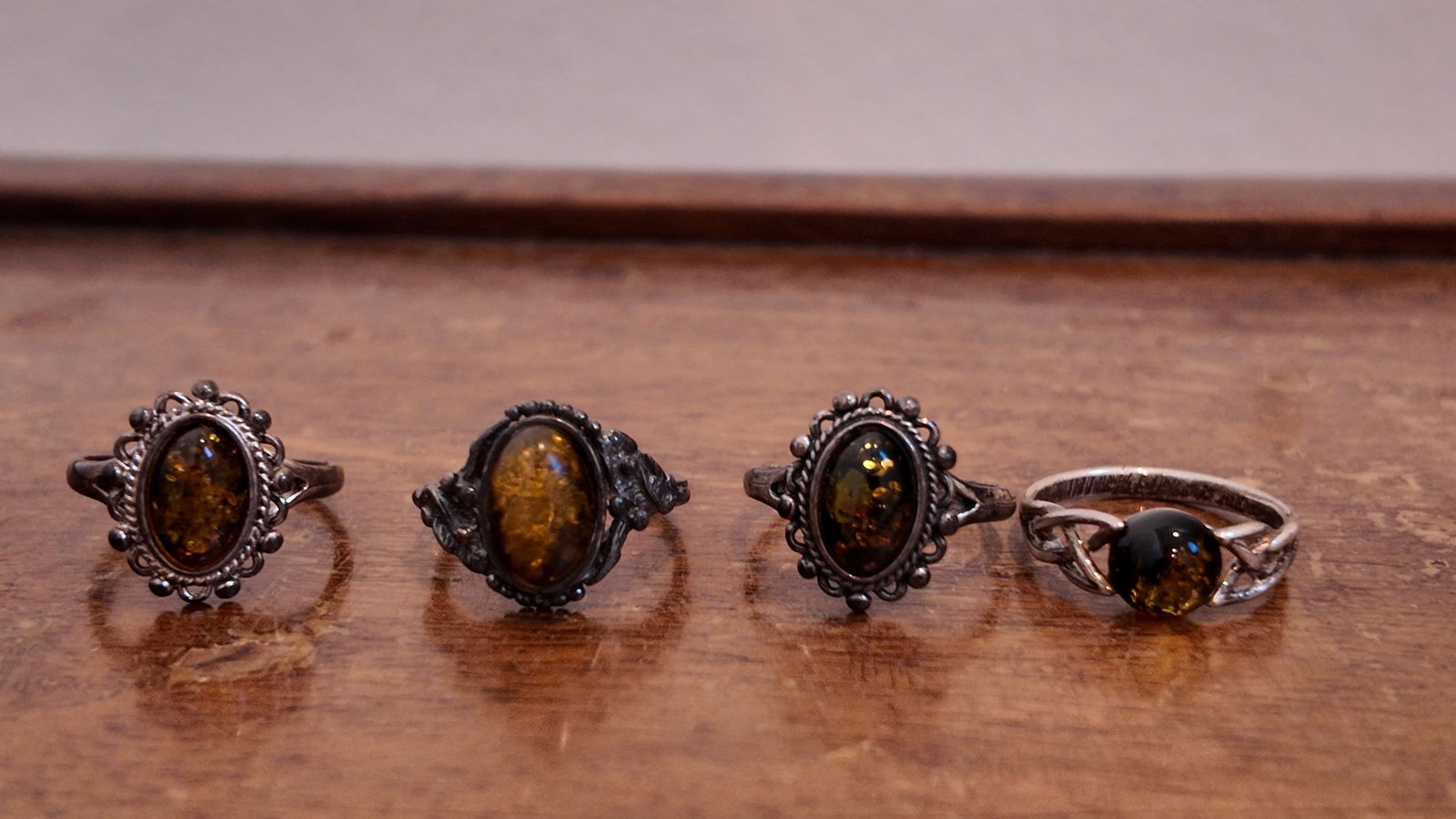 Four pieces of antique sterling silver amber rings (1 of 4)