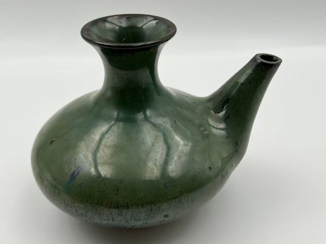 Chinese Celadon-Glazed Ewer: This lot is located in China. Please review the pre-auction notice prior to bidding.