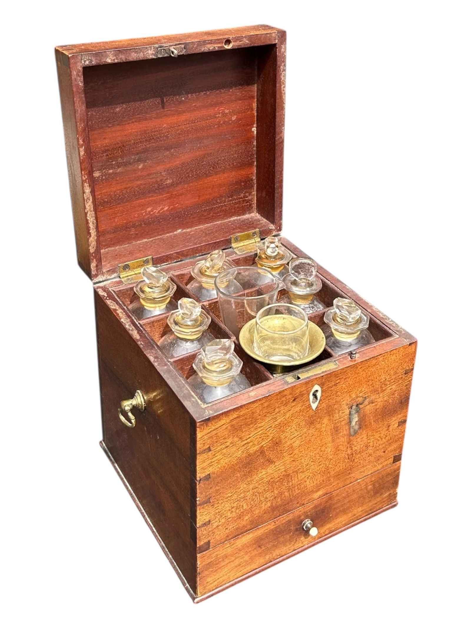 A 19TH CENTURY APOTHECARY BOX Housing glass bottles with stoppers and other utensils. (h 17.5cm) (1 of 3)