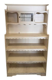 AN EARLY 20TH CENTURY ART NOUVEAU PAINTED BOOKCASE With single leaded glazed door above open: AN EARLY 20TH CENTURY ART NOUVEAU PAINTED BOOKCASE With single leaded glazed door above open shelves. (h 160cm x d 33cm)