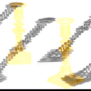 Pair of English Georgian Brass Candlesticks with Ejectors: Well-cast pair of brass candlesticks with square stepped bases, baluster stems, and integral push-rod ejectors. The ejector mechanism is visible through the bobeche openings and the turned bases displ