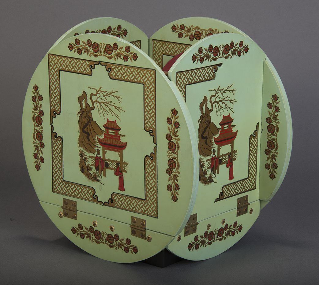 Cabinet of Foo - Walter Sheppard: Cabinet of Foo - Walter Sheppard. Round-paneled cabinet opened on all sides to reveal an inner cabinet that is also shown empty. When closed, a large production of silks and livestock is made. Decorat