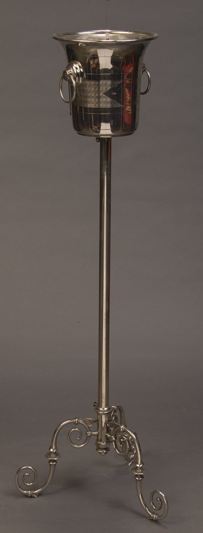 Overflowing Misers Dream Pail: From Europe, and obtained from the Las Vegas Magic & Movie Hall of Fame. The performer produces numerous coins during a Misers Dream routine and drops them in the champagne bucket. Thanks to the bucke