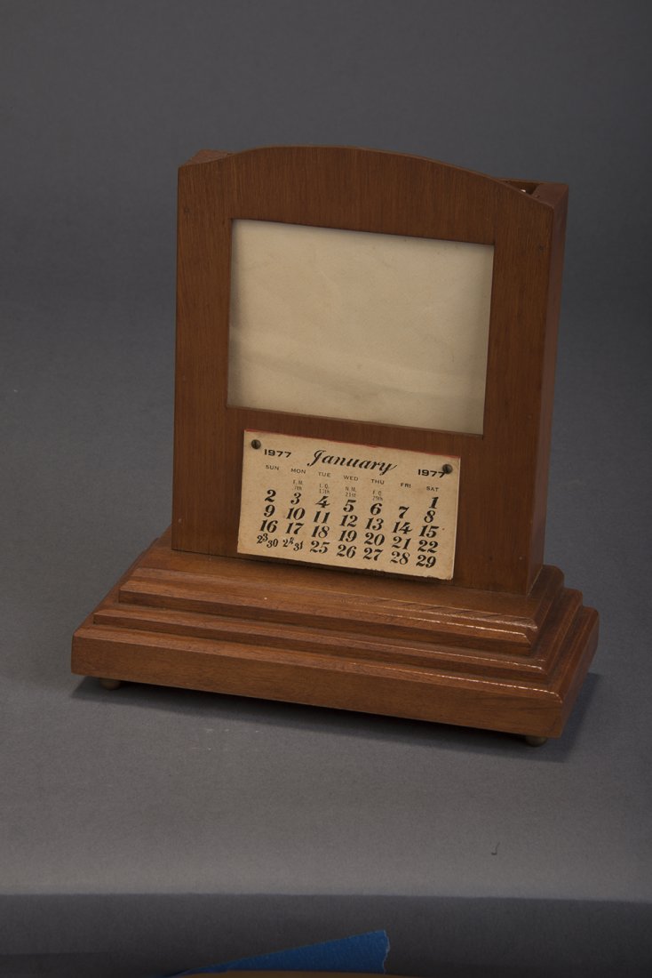 Devil’s Mailbox - Owen Magic: Finely crafted wooden desktop secretary that allows envelopes to be switched in plain view. c. 1977. By merely placing the envelope in the open rack above the calendar, the change is made. So undetect