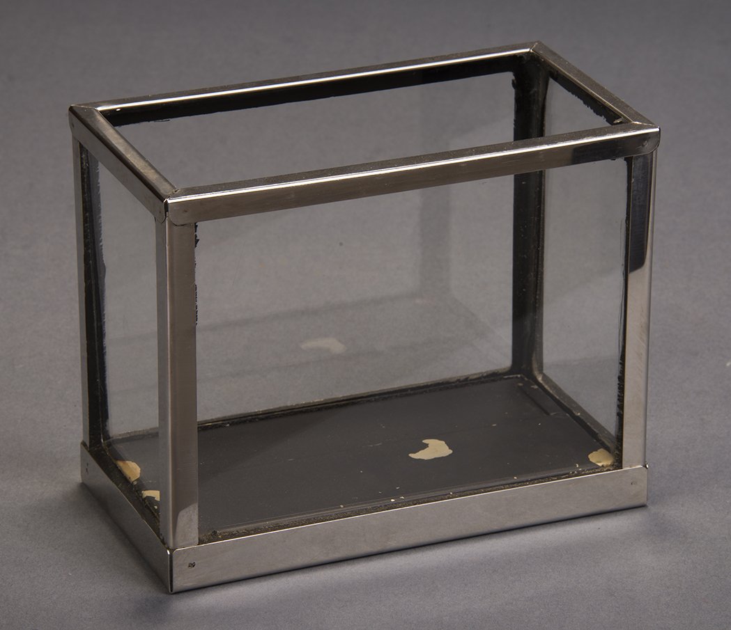 Aquarium- Petrie-Lewis: A metal-bound glass aquarium filed with water is shown. Instantly it becomes filled with goldfish. Finely made by Petrie-Lewis. c. 1940. Condition: Very Good.