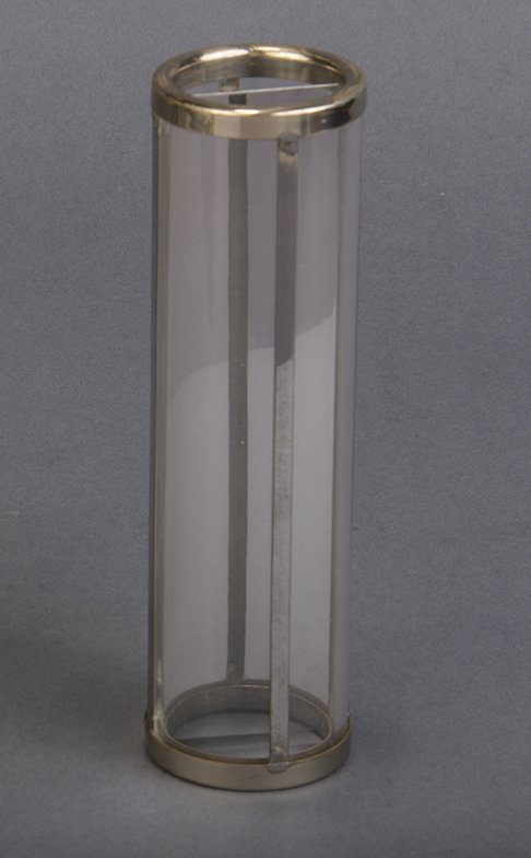 Utility Tube – Petrie & Lewis: Clear celluloid tube, bound with metal bands that allows the production, vanish or exchange of silks or other small items. c. 1939. Condition: Very Good.