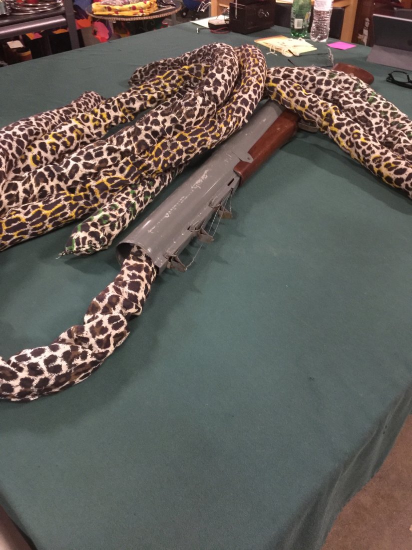 Owen Heckle Gun: A Merv Taylor idea. Large comical rifle “shoots” an assortment of spring snakes when the trigger is pulled. Can fire three times. Condition: Very Good.