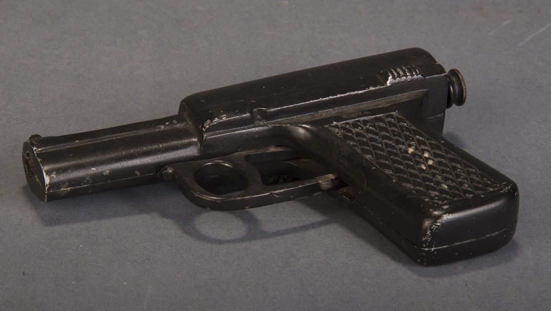 Silk Gun - Joseph: Silk handkerchief placed over the barrel of a simulated Mauser hand gun visibly vanishes when a shot is fired. Precision-made. Circa 1940. Condition: Very Good.