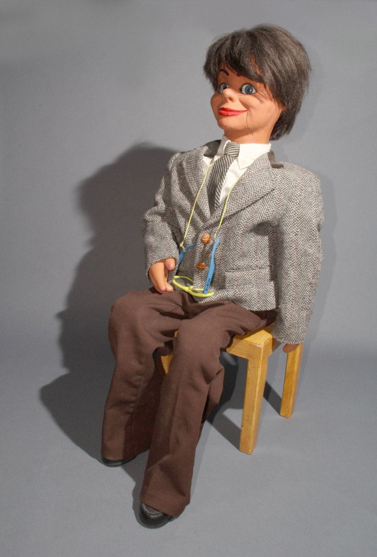 VENTRILOQUIST FIGURE: BOY – MAHER: Detailed large figure of a boy with movements including: mouth, eyes and single winking eyelid. Dressed in shirt and tie with tweed jacket, brown slacks and black shoes. With sunglasses. Maher Studios