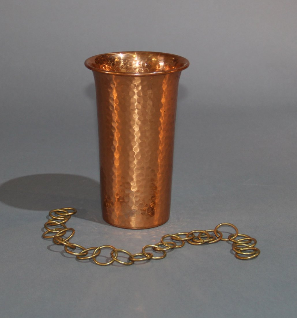 “LINKAGE” (AKA: MAGIC WELDING) – OKITO/REDMON: Separate links of chain are poured from a hammered copper-finished cocktail shaker into a small glass. At the magician’s command the links are poured from the glass and are now linked into a chain. 