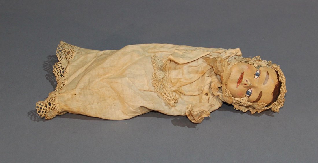 SPRING BABY – SMALL: Bland? 12” long baby doll may be produced from wherever desired by the magician. Finely detailed. Circa 1890. Condition: Overall very good. Some wear from age. Rare.