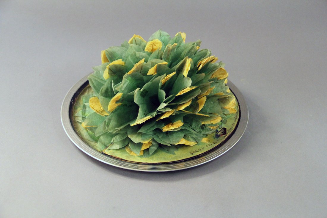 Flower Production Tray - Abbo: Circa 1950. An empty metal tray becomes filled with yellow flowers. At the magician’s command, the flowers instantly change to red. Nicely made. Condition: Very good. Some wear to the flowers from a