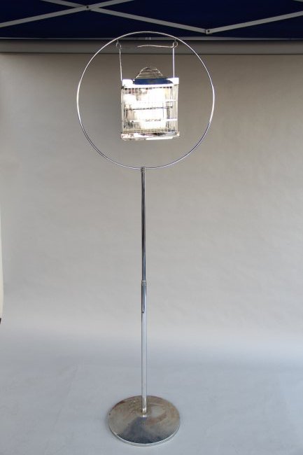 “The Phoenix” Target to Cage Transformation: Circa 1930. (After Bartl.) A canary is caused to vanish. Attention is called to a nickeled target suspended from a floor stand. A spectator takes aim with a pistol (not supplied) and fires the gun. In