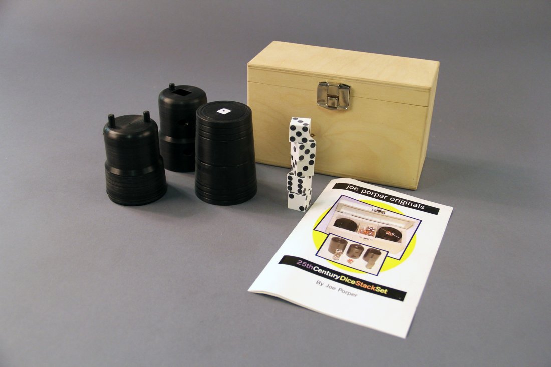 Joe Porper 25th Century Dice Stack Set: Beautifully machined Delryn dice cup and loaders allows an amazing dice stacking routine, first dispensing dice one-at-a-time, and finishing with a stack of 40 quarters (not included) appearing from i