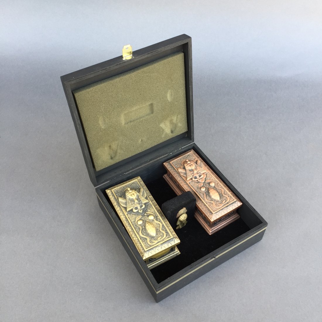 Wandering Mummies: Ca 1990's. German - An incredible transposition of a mummy from one sarcophagus to another. Exquisitely made. Uncommon. With case as pictured.