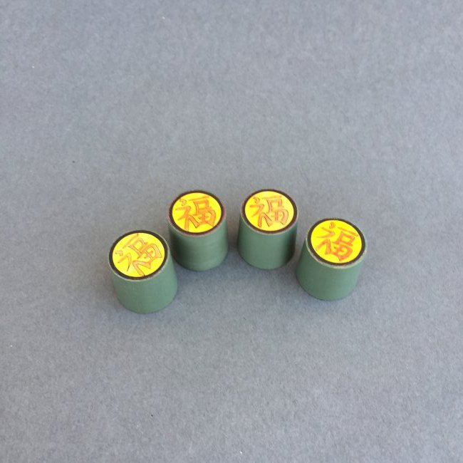 Chink a Chink - Anverdi: By Anverdi, four blocks with Asian writing on them magically transpose positions under the cover of the magician’s bare hands. Magnetically locking gimmick and plastic holding case. Quarter shown fo