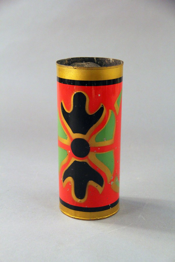 Thayer Hindu Water Tube: Circa 1940. Water is poured into a brightly decorated 9 ½“ X 4”metal tube. Then a large production of dry silks ensues. Condition: Good. Some chips to finish from use/age, otherwise nice.