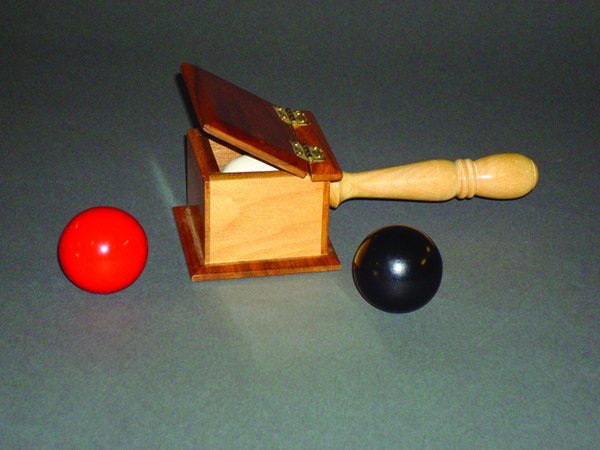 (Apparatus) Ballot Box: (Apparatus) Ballot Box. Carl Owen, Owen Magic, ca. 1967. Three different colored balls are shown. A spectator is asked to place one of them in a small box held behind his back. The performer is able t
