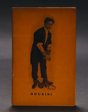 (Houdini) The Adventurous Life of a Versatile Art: (Houdini) The Adventurous Life of a Versatile Artist. Early edition in yellow wraps, 63 pages. Front cover shows Houdini in chains, rear cover shows "Harry Houdini At Different Ages Of His Career."