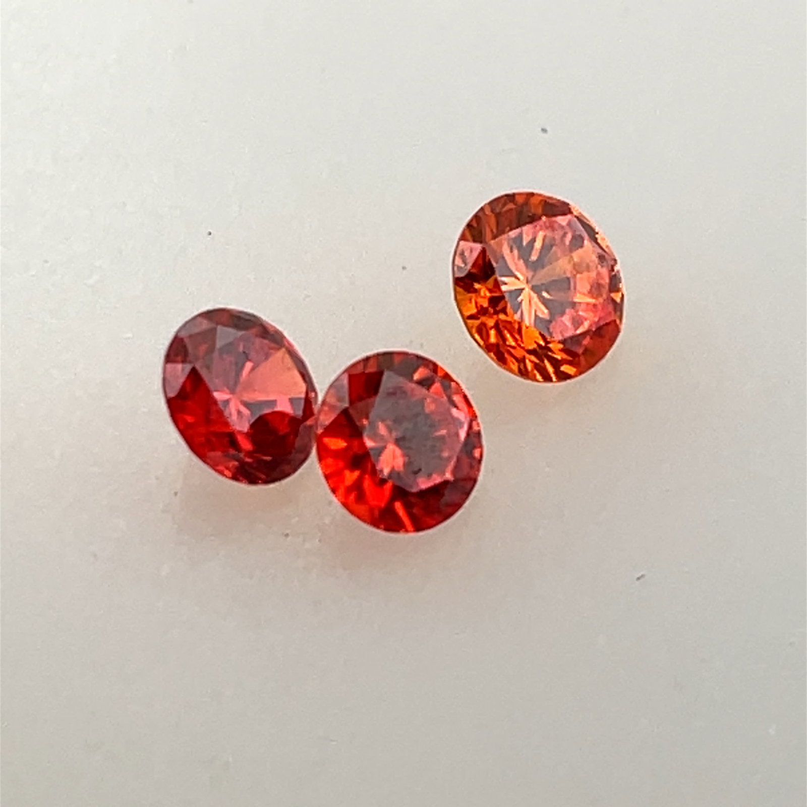 Round Spesaarite Garnet Trio Loose Gemstone - 6.1 - 5ct: These gems are from the estate of a professional jeweler. They were his pesonal collection, many faceted by himself. This is the first of several auctions of his jewelry making materials. Gems were ca