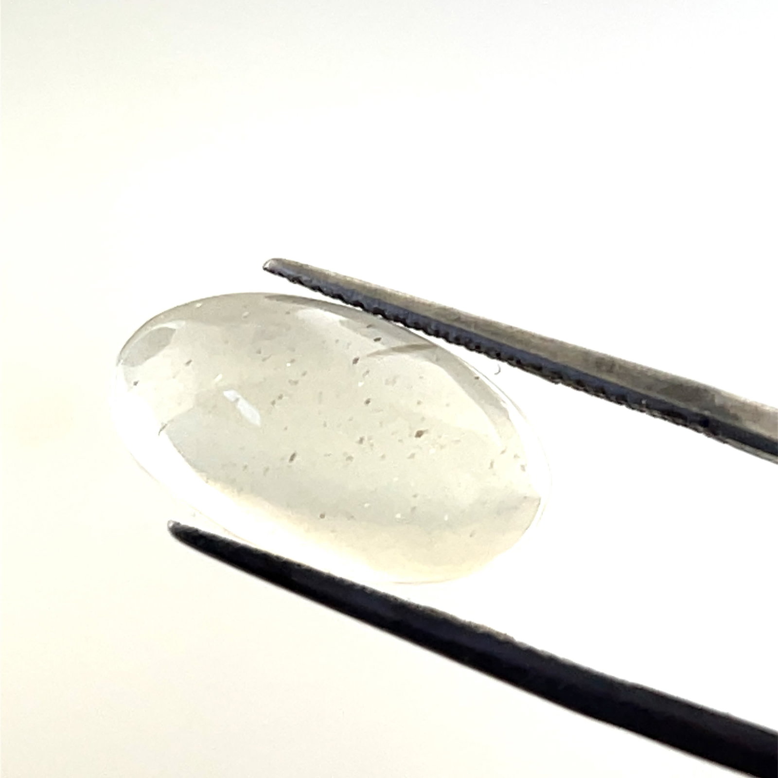 Clear Moonstone Oval Cabochon Loose Gemstone - 16.9x9.6 - 5.5ct: These gems are from the estate of a professional jeweler. They were his pesonal collection, many faceted by himself. This is the first of several auctions of his jewelry making materials. Gems were ca