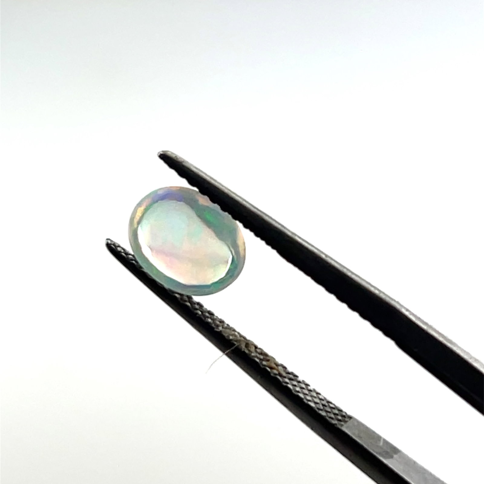 Clear Moonstone Cabochon Loose Gemstone - 6.3x7.5 - 1ct: These gems are from the estate of a professional jeweler. They were his pesonal collection, many faceted by himself. This is the first of several auctions of his jewelry making materials. Gems were ca