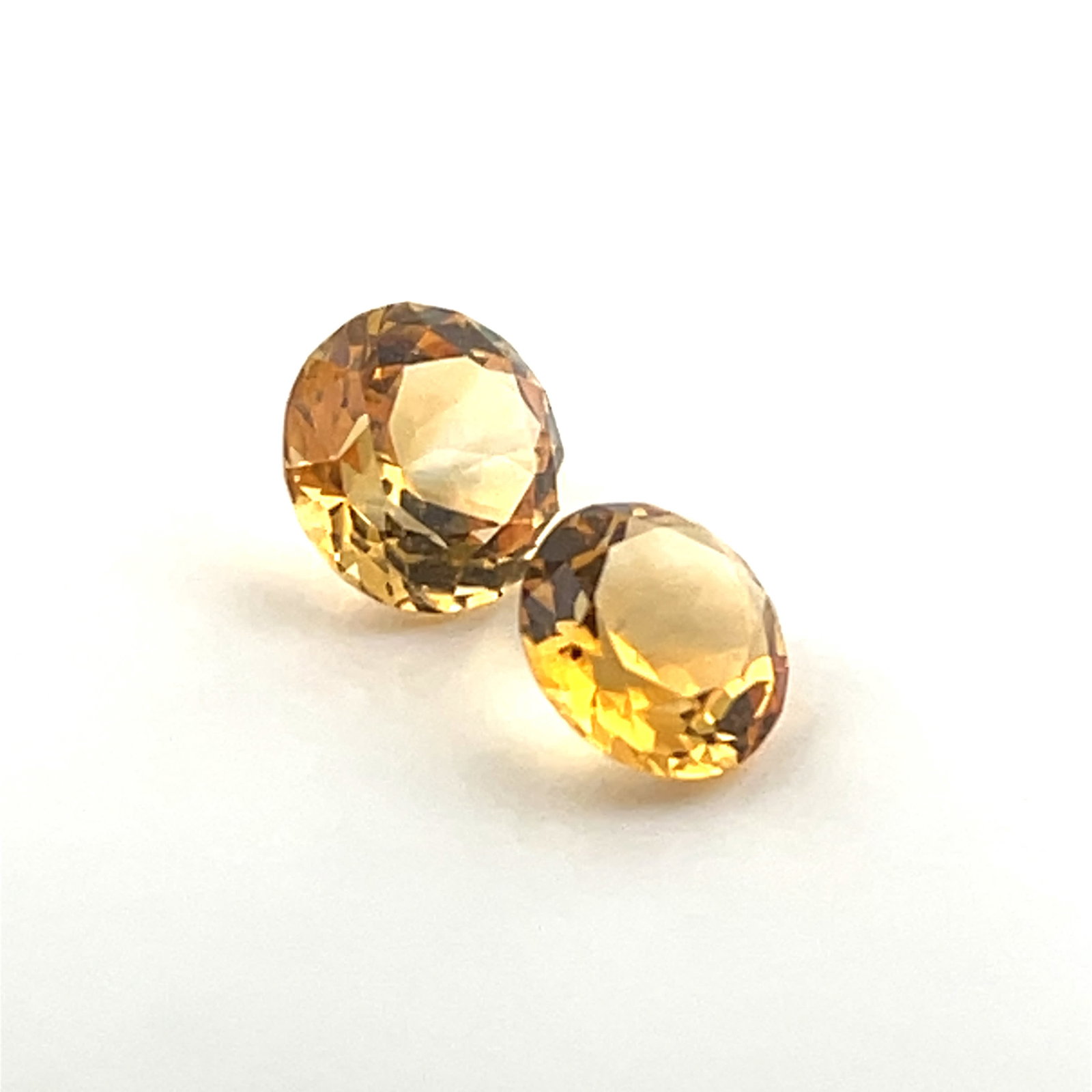 Loose Gemstone Brilliant Cut Yellow Citrine Matched Pair - 3.6ct - 8.5x8.5: These gems are from the estate of a professional jeweler. They were his personal collection, many faceted by himself. This is the first of several auctions of his jewelry making materials. Gems were c