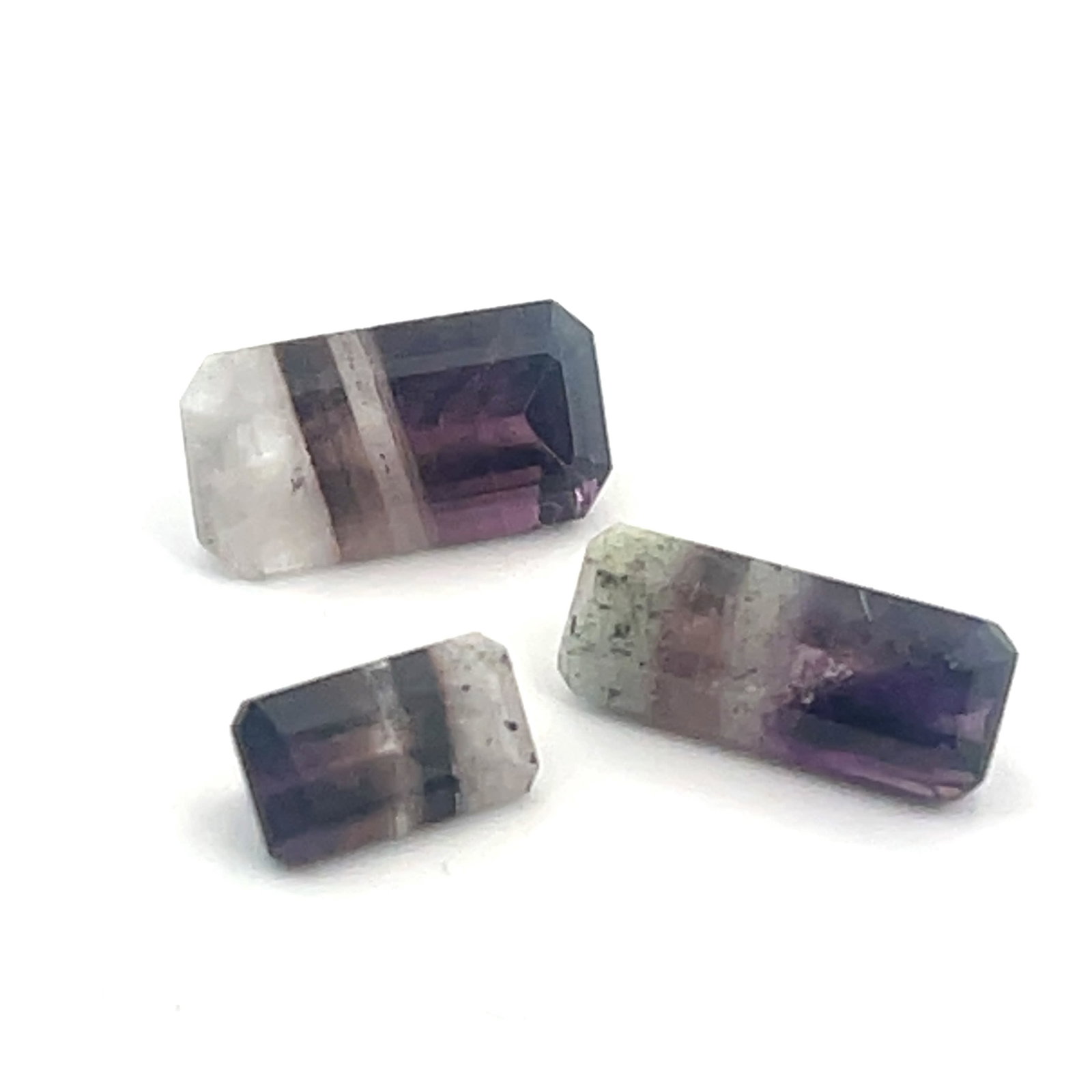 Loose Gemstones Variegated Amethyst Emerald Cut - 10.2ct - 7.8x14.8: These gems are from the estate of a professional jeweler. They were his personal collection, many faceted by himself. This is the first of several auctions of his jewelry making materials. Gems were c