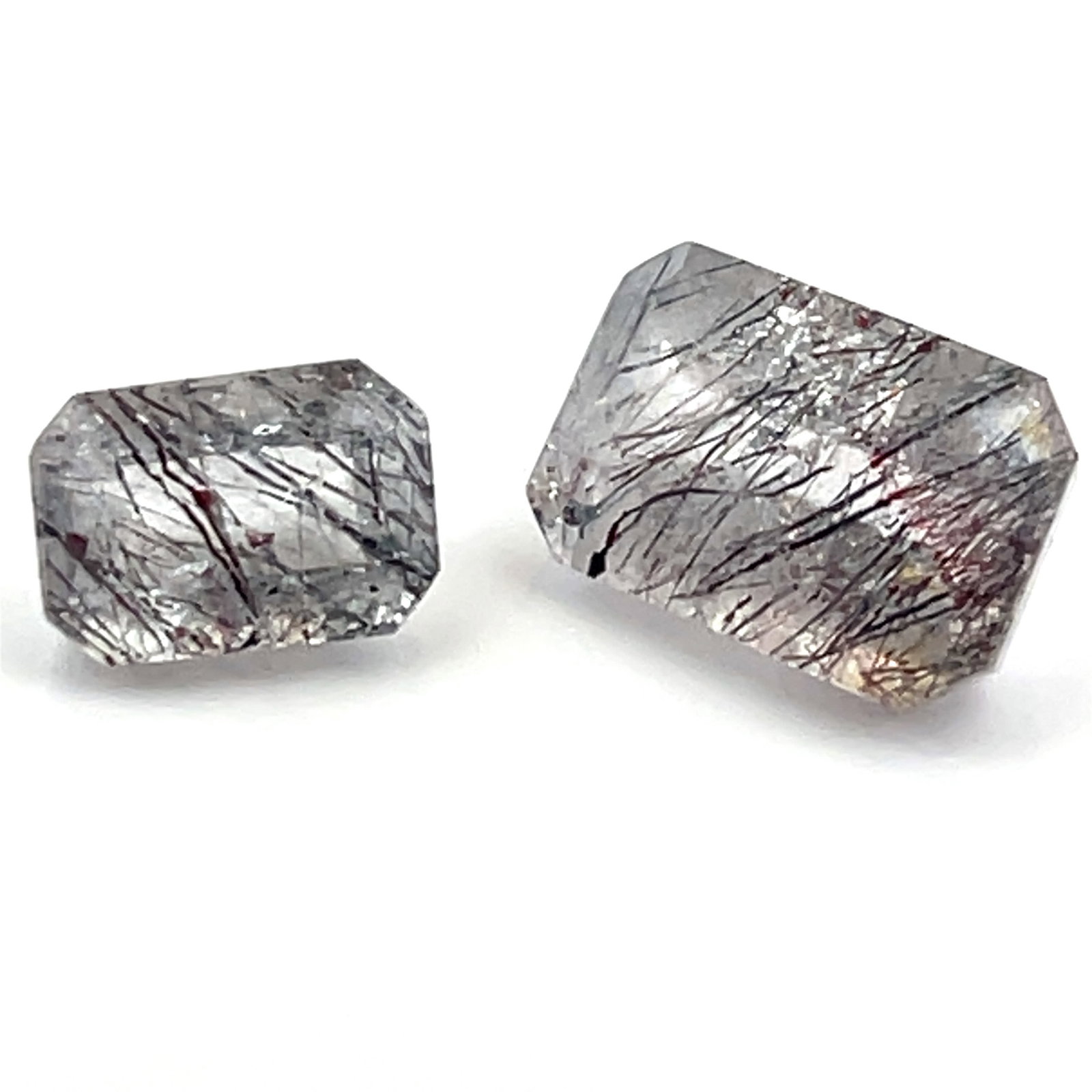 Loose Gemstone Tourmaline Rutilated Quartz Emerald Cut Pair - 17.88ct - 16.3x11.5: These gems are from the estate of a professional jeweler. They were his personal collection, many faceted by himself. This is the first of several auctions of his jewelry making materials. Gems were c
