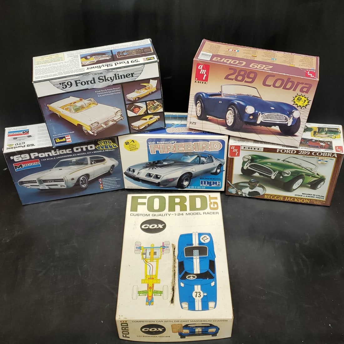 Collection of Car Models '59 Skyliner, 289 Cobra, '69 GTO, and More: "Fresh to market from a lifetime collector. A nice selection of vintage tin and pressed steel along with die cast model and car related ephemera. All measurements are approximate.