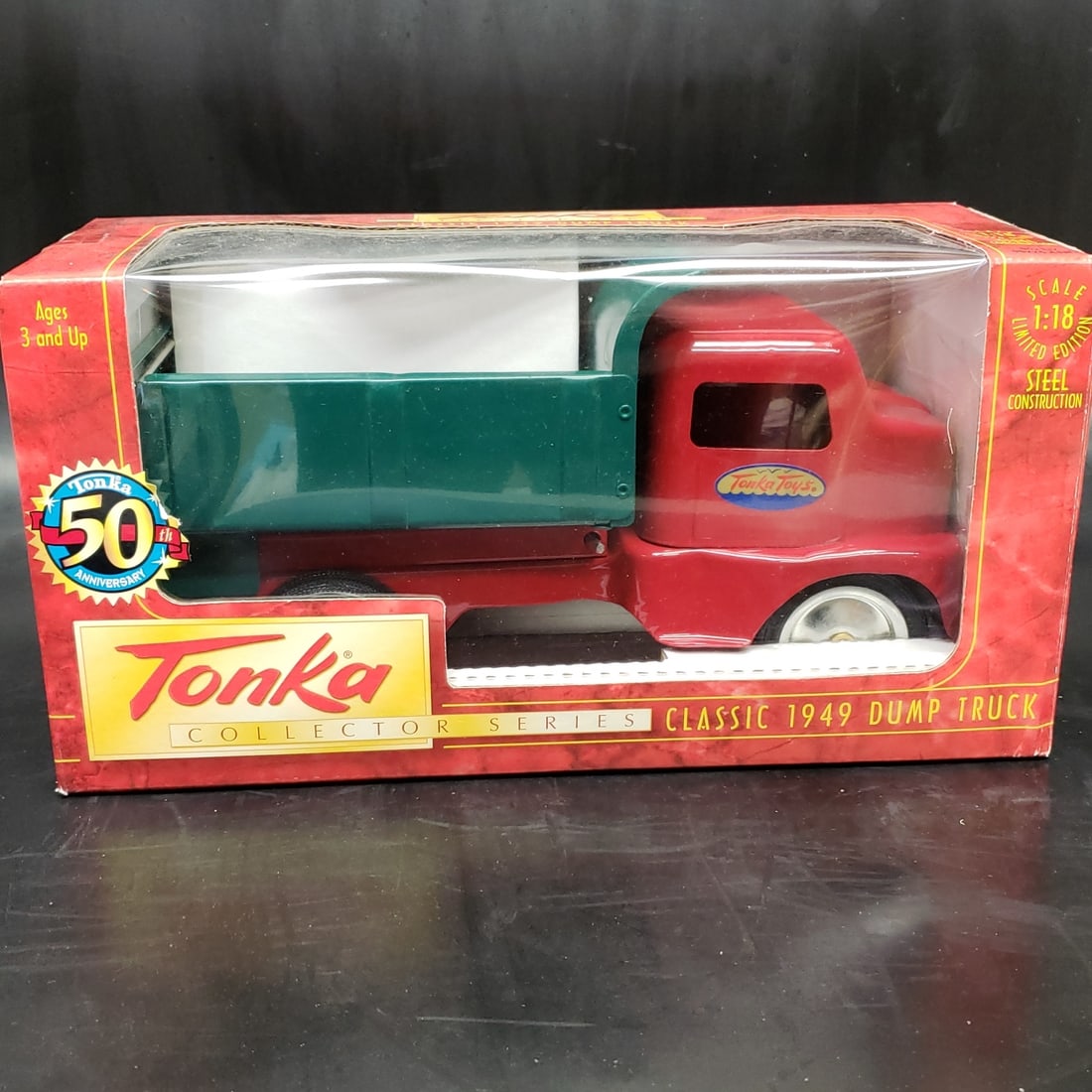 Tonka Collector's Series 1949 Dump Truck #1 New: "Fresh to market from a lifetime collector. A nice selection of vintage tin and pressed steel along with die cast model and car related ephemera. All measurements are approximate.