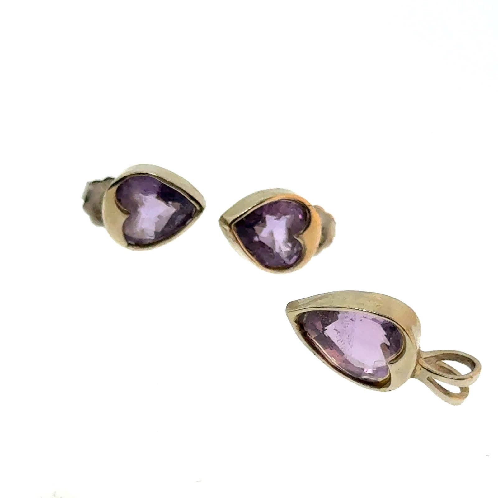 Silver and Amethyst Earring and Pendant Set - 3.3g: A wonderful selection of estate jewelry including some antique heirloom pieces with family provenance. Item weights and dimensions are approximate. 4"x4"x4" 8oz shipping weight and dimensions.All weig