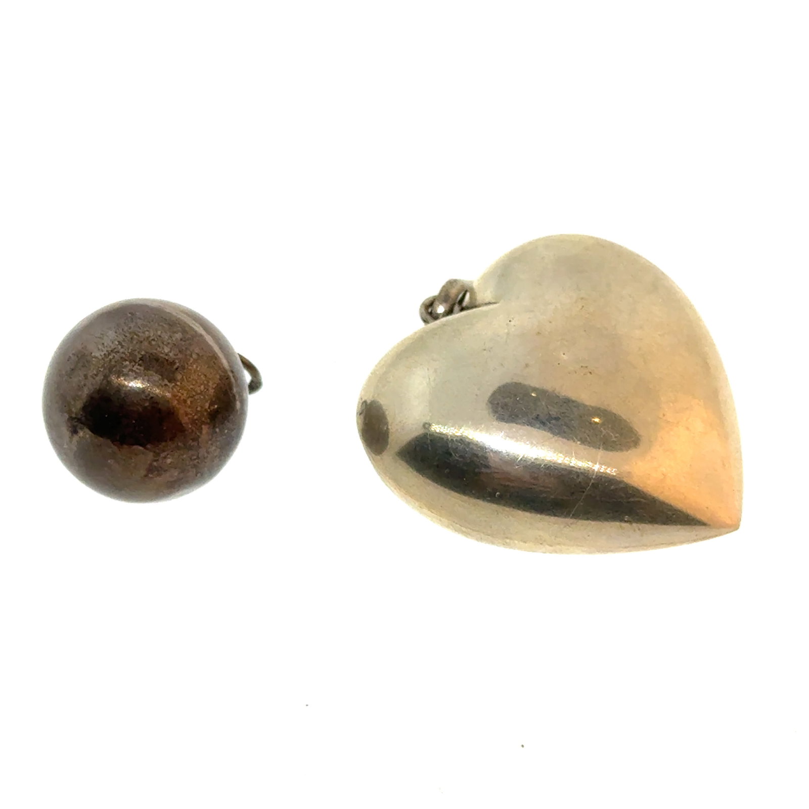 Hollow Heart and Tingling Sphere Silver Pendants - 21.25g: A wonderful selection of estate jewelry including some antique heirloom pieces with family provenance. Item weights and dimensions are approximate. 4"x4"x4" 8oz shipping weight and dimensions.All weig
