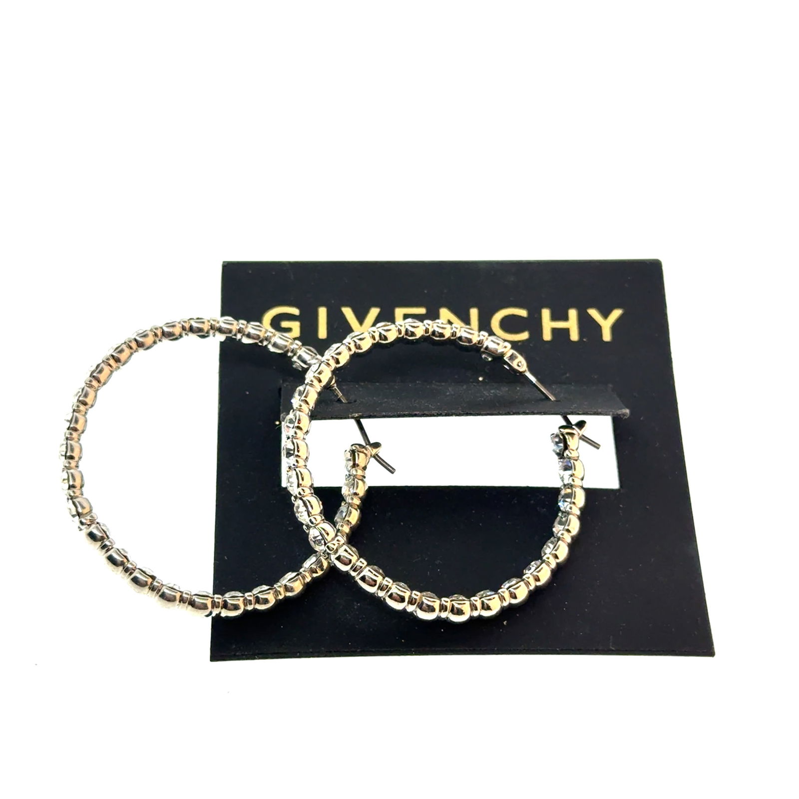 Givenchy Hoop Earrings - g: A wonderful selection of estate jewelry including some antique heirloom pieces with family provenance. Item weights and dimensions are approximate. 4"x4"x4" 8oz shipping weight and dimensions.All weig