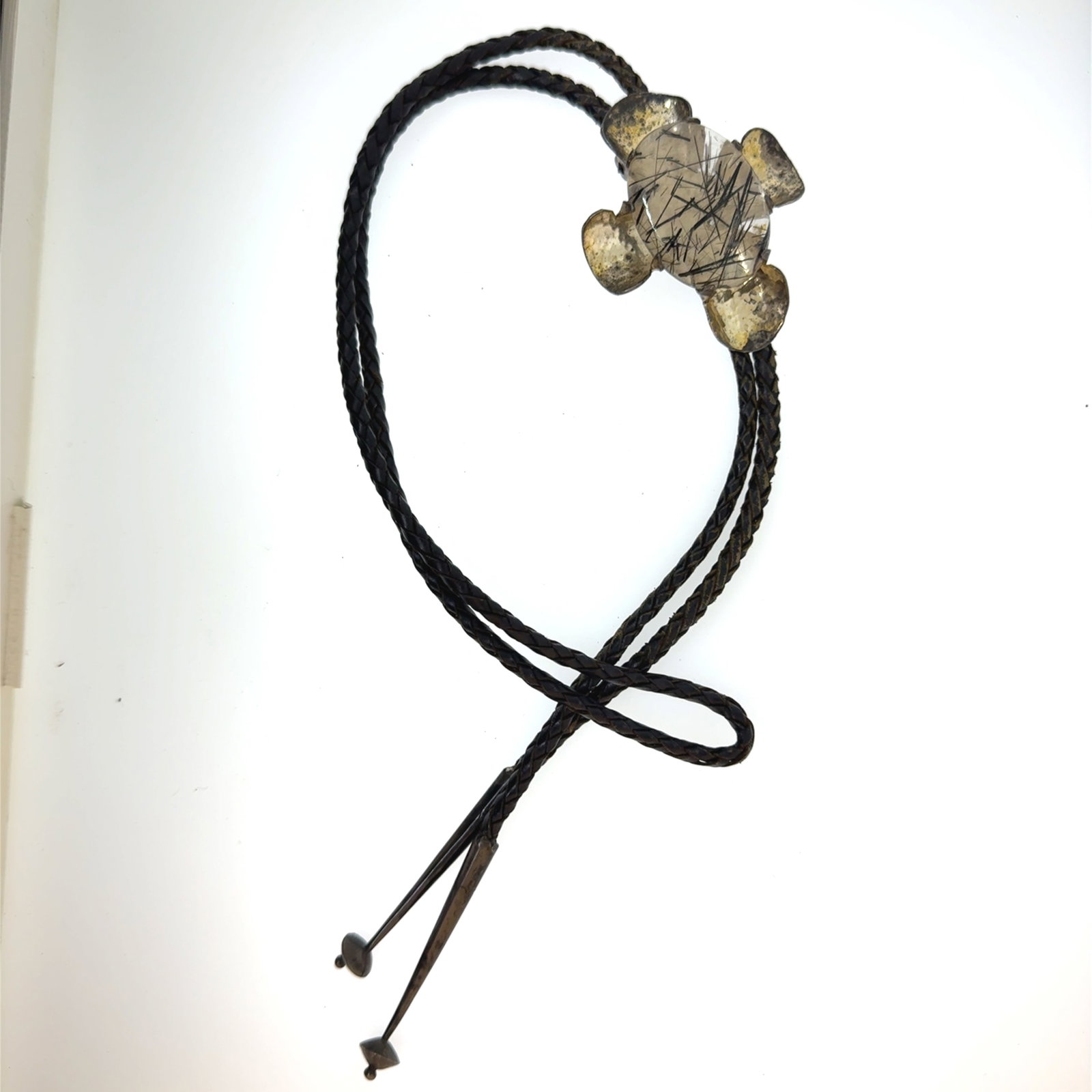 Rutilated Quartz and Silver Bolo Tie - 66x51mm - 1.5 oz: "This is a continuation of our Pro Jeweler's Estate auctions. This auction includes his personal bolo tie collection as well as several of his own art jewelry pieces. There are other Southwest styled 