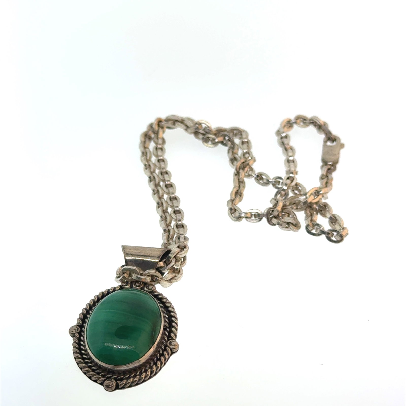 Sterling and Malachite Pendant Signed RD + Silver Chain - - 0.9 oz: "This is a continuation of our Pro Jeweler's Estate auctions. This auction includes his personal bolo tie collection as well as several of his own art jewelry pieces. There are other Southwest styled 